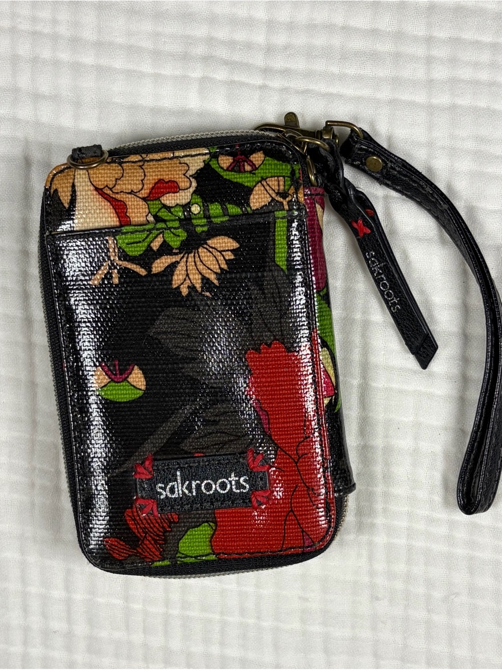 Sakroots Black Floral Peace Print Wristlet Coated Canvas